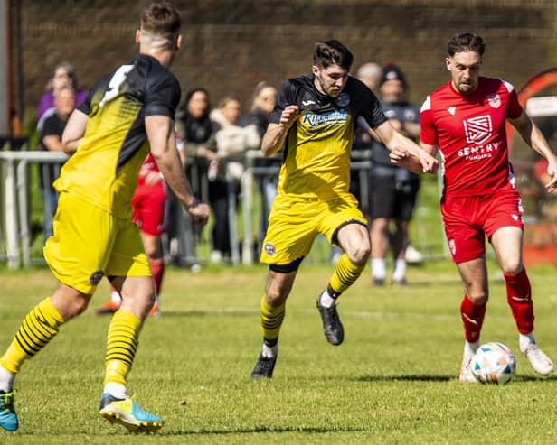 Action from the Seaford-Wick final - but it was marred by trouble that has led to a number of Wick fans being told they will be banned for life | Picture: Paul Trunfull