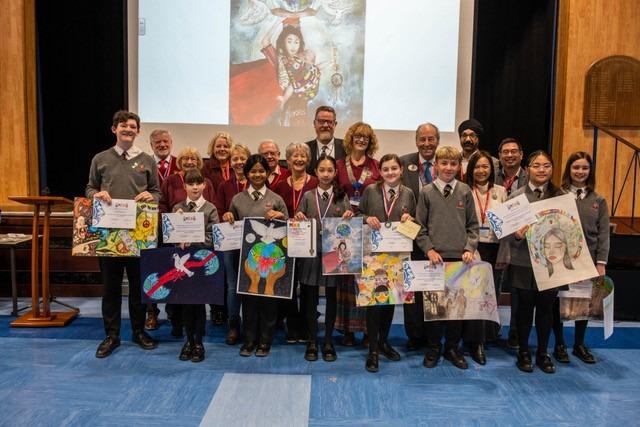 Students from St Richard's School with their peace posters