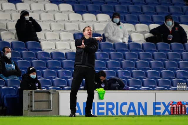 Graham Potter, manager of Brighton and Hove Albion gives their team instructions during the Premier League match between Brighton & Hove Albion and Aston Villa at American Express Community Stadium on February 13, 202.