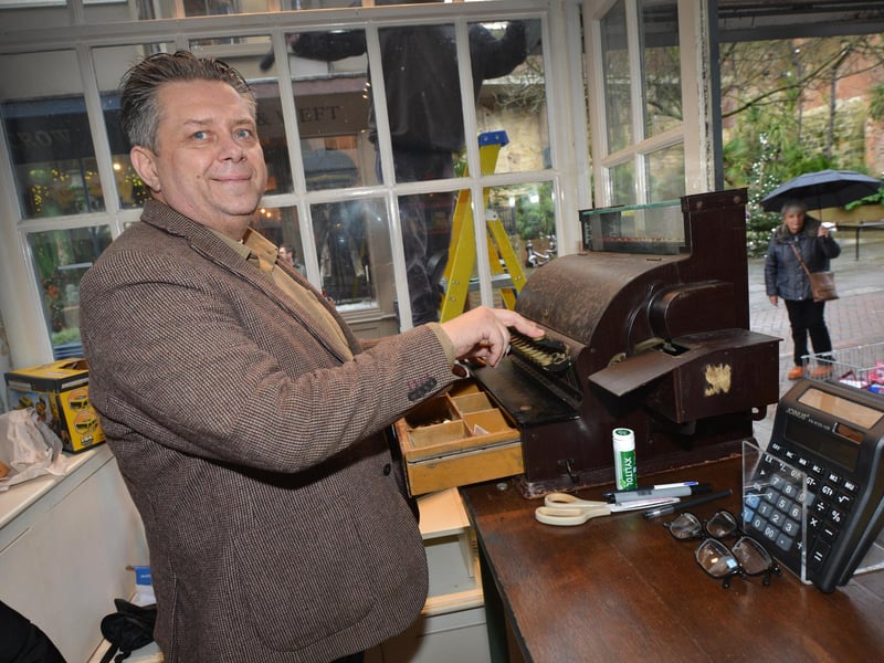 Opening of Arkwhites Best Before Store in George Street, Hastings Old Town, on December 13 2023. Alex White with his antique till.