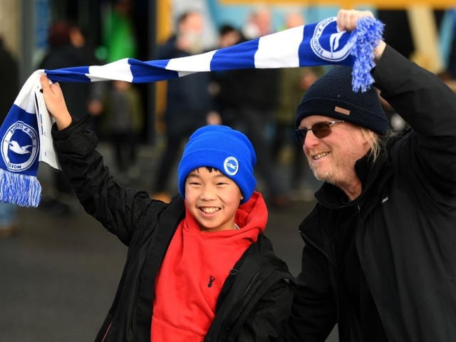 BRIGHTON, ENGLAND - JANUARY 14: A young Brighton & Hove Albion fan show his support prior to the Premier League match between Brighton & Hove Albion and Liverpool FC at American Express Community Stadium on January 14, 2023 in Brighton, England. (Photo by Mike Hewitt/Getty Images)
