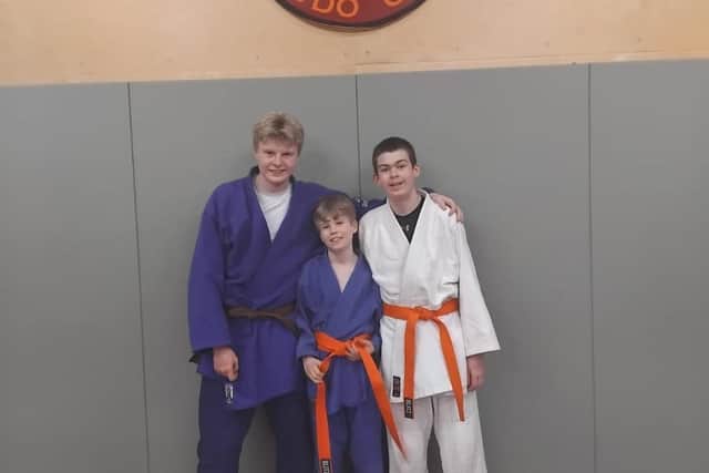 Teddey, 11, Charlie, 13, and Mikey Ede, 16, are all judo champions and gold medallists in numerous events and competitions. Picture: Tim Cobb PR