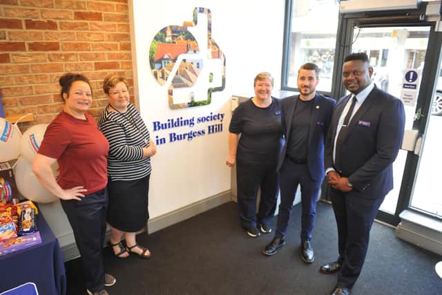 Staff at the Burgess Hill branch of Nationwide celebrate 50 years of the company being in the town. (Picture: Steve Robards/National World)
