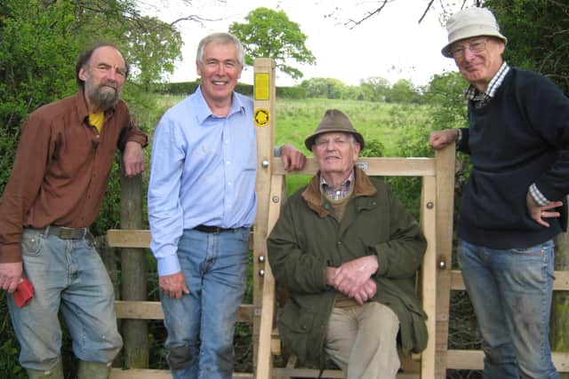 Harold Rowling (centre right) with team members from The Monday Group