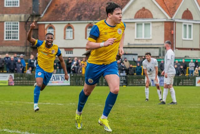 James Hull celebrates after scoring a penalty for Eastbourne Town v United | Picture: Kyle Hemsley
