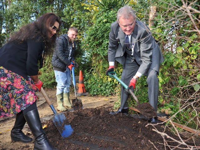 Deputy Lieutenant Hugh Bonneville and Worthing mayor Henna Chowdhury helping the commemorative tree