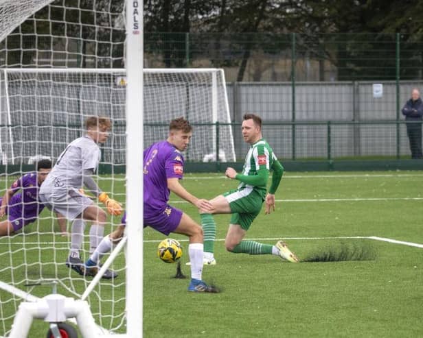 Burgess Hill Town concede one of their three goals against Chichester City on Saturday | Picture: Neil Holmes