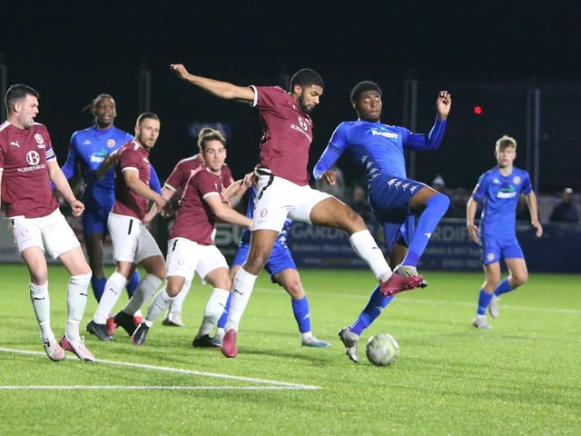 Action between Worthing and Hastings United in the Sussex Senior Cup semi-final at Lancing