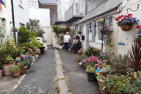 Residents of Brunswick Cottages enjoying their shared courtyard