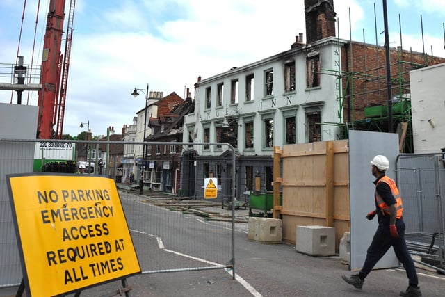In pictures: Scaffolding begins at historic fire-damaged hotel site The ...