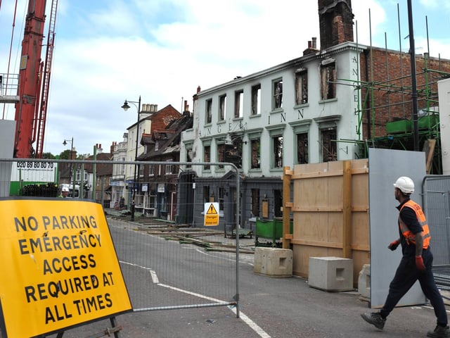 Scaffolding work has started on the Angel Inn in Midhurst. Pic S Robards SR2305311