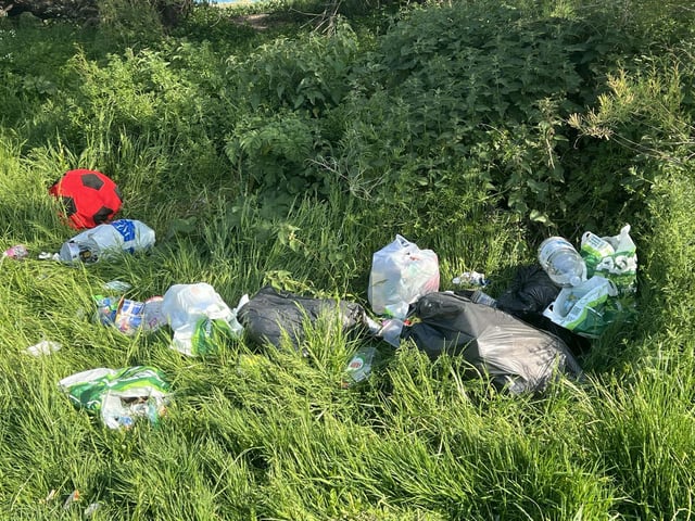 Council workers have been clearing rubbish and repairing 'damaged bollards' after a group of travellers left Goring Gap.