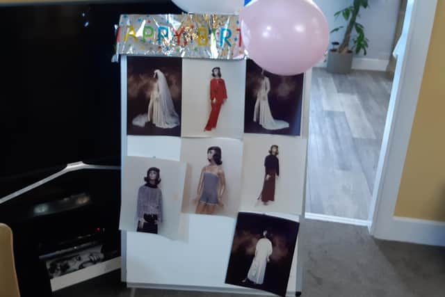 Eva Cook's fashion designs, on display at her birthday tea