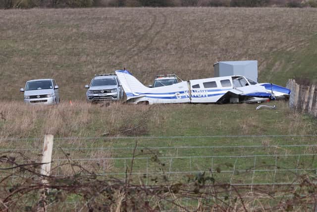 The Piper PA-32-300, G-KNOW plane had crashed on open downland – at Steyning Valley, South Downs Way – and the two occupants suffered serious injuries. Photo: Eddie Mitchell