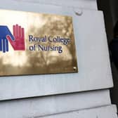 A photograph taken on January 11, 2023 shows the entrance plaque of the Royal College of Nursing (RCN), a UK's trade union for those in the nursing profession, with its logo, in London. (Photo by ISABEL INFANTES / AFP) (Photo by ISABEL INFANTES/AFP via Getty Images)