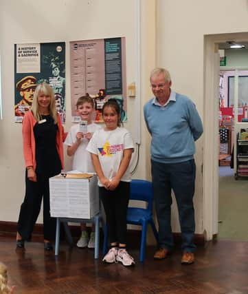 Mrs Zoe Gordon, head teacher of North Mundham Primary School, Toby and Hannah, year 6 pupils, and Mr Peter Theobald