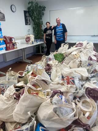 The results of a Lewes supermarket collection with Debbie Twitchen and volunteer Clive Tedder