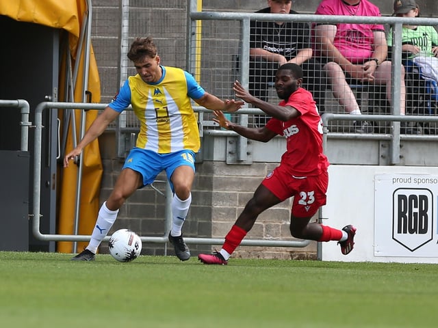 Action from Worthing's 3-0 win at Torquay United which put them top of National League South
