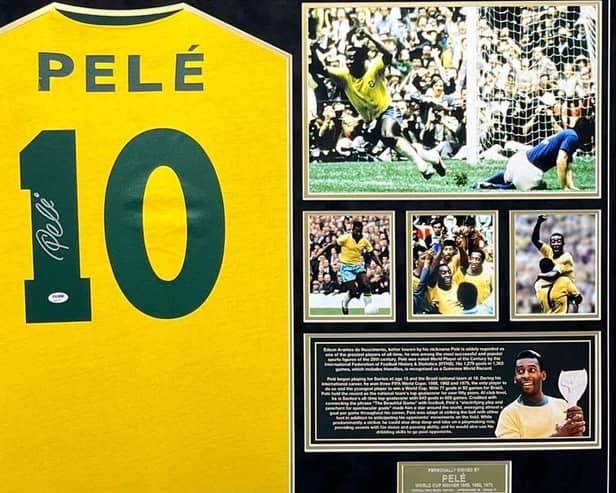 The signed Pele shirt available for auction