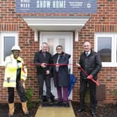 Aldingbourne Parish Council Chair Michael Warden (third from left) helps launch the new homes