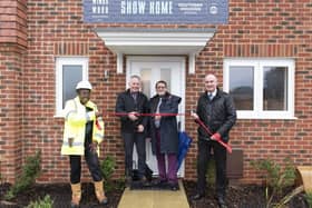 Aldingbourne Parish Council Chair Michael Warden (third from left) helps launch the new homes