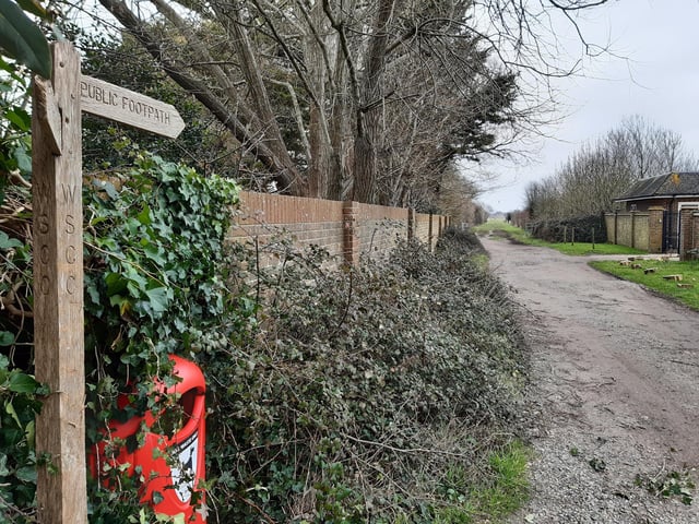 Follow the footpath on to open farmland
