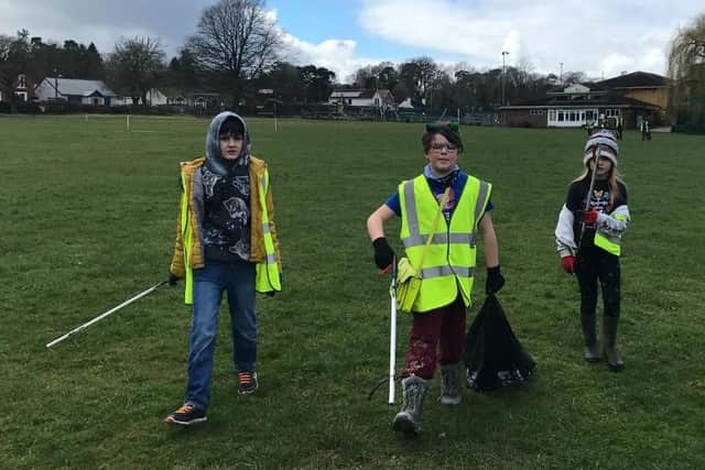 Young people litter-picking outside Chanctonbury Leisure Centre in Storrington