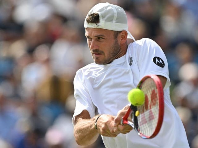 US player Tommy Paul returns to Argentina's Francisco Cerundolo during their men's singles final tennis match at the Rothesay Eastbourne International tennis tournament in Eastbourne, southern England, on July 1, 2023. (Photo by Glyn KIRK / AFP) (Photo by GLYN KIRK/AFP via Getty Images):Action from Saturday's finals at the Rothesay tennis international at Devonshire Park, Eastbourne