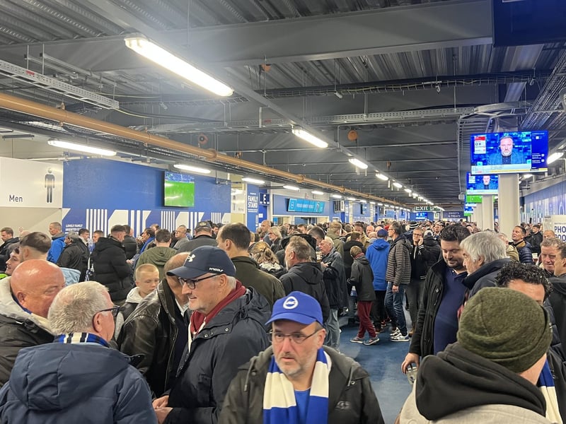 Supporters gathering in for some food at half-time, as Brighton and Hove Albion lead 1-0 at the break.