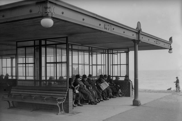 Day trippers relaxing on the promenade at Worthing in March 1931