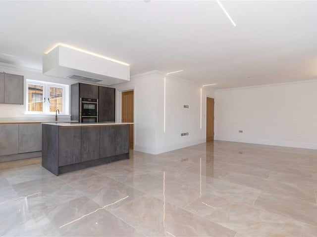 Offers in excess of £900,000 are invited for this new luxury property in Mill Lane, High Salvington. It has beautiful views over the South Downs, versatile and spacious accommodation.