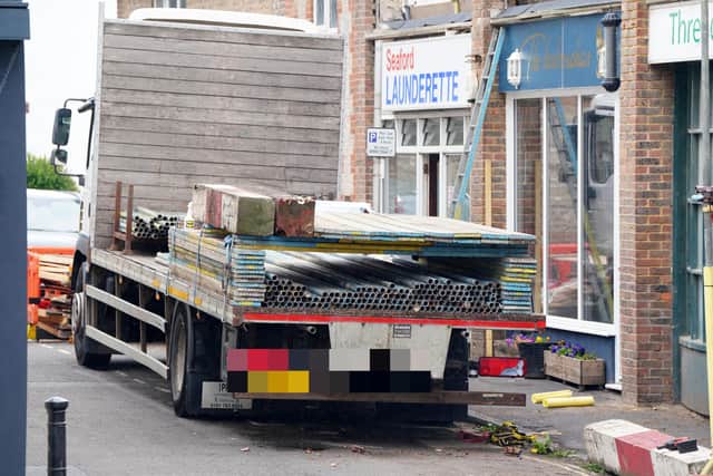 The scaffolding around The Barber's Chair in Saxon Lane, Seaford, being removed in July 2023. Photo by Eddie Mitchell