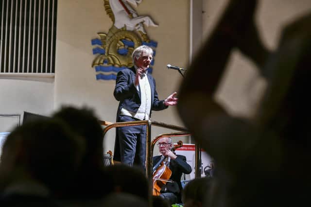 WSO conductor John Gibbons leads the audience clapping – pic by Andrew Mardell
