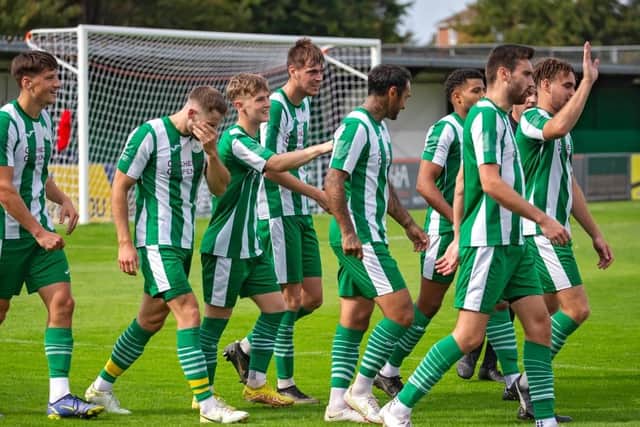Chichester City's players celebrate one of the five they put past Hythe Town | Picture: Neil Holmes