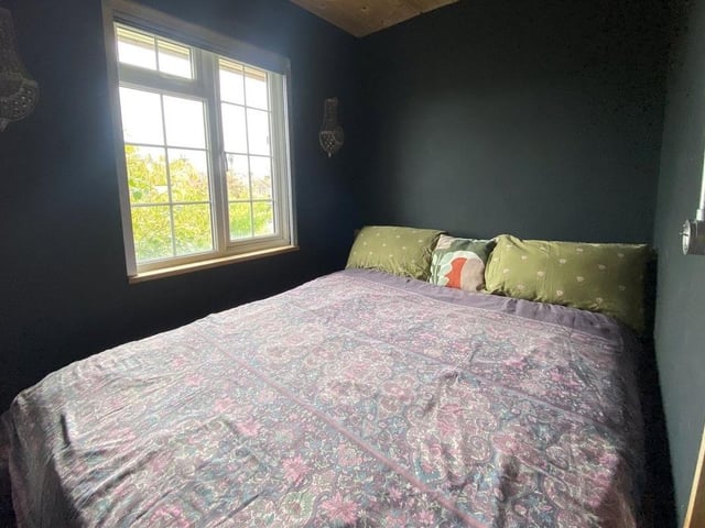 Two bedrooms are currently used for sleeping and the house features a walk-in wardrobe