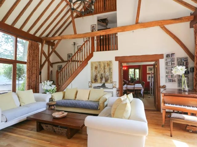 This five bed converted barn in Anmore Road, Denmead is on the market for £1.4m. It is listed on Zoopla by White & Guard Estate Agents.