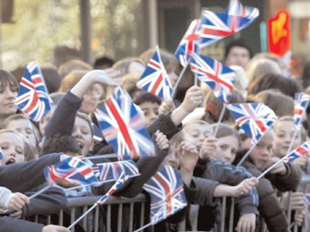Youngsters wave flags