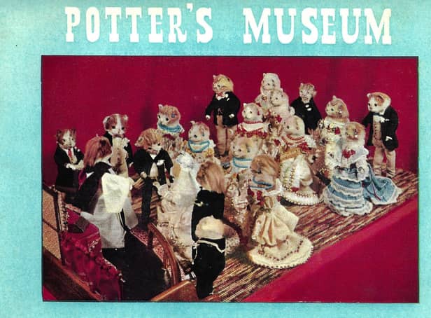 A poster featuring a wedding for cats, created by Walter Potter