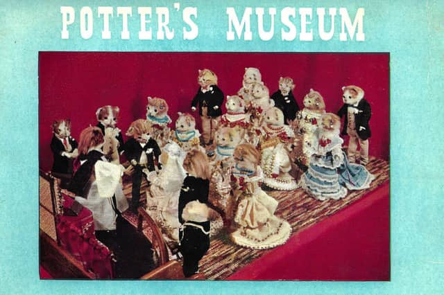 A poster featuring a wedding for cats, created by Walter Potter
