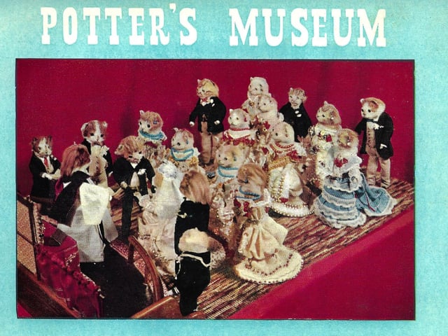 A poster featuring a wedding for cats, created by Walter Potter
