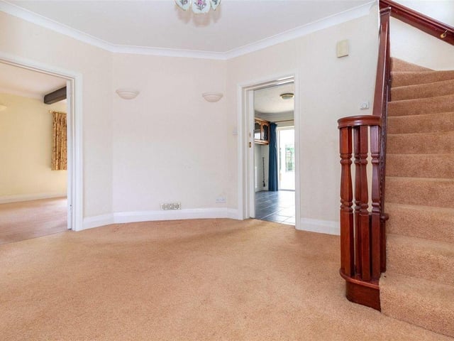 The grand entrance hall is east facing