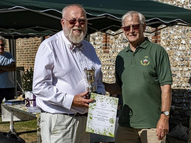 David Stubbings receives the David Mackenzie Thorowgood Memorial Cup from Colin Crane at East Preston and Kingston Horticultural Society flower show