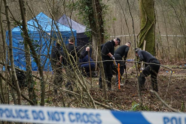 Police at the scene in woodland in Marley Lane, Battle