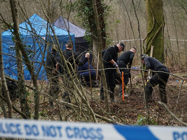 Police at the scene in woodland in Marley Lane, Battle