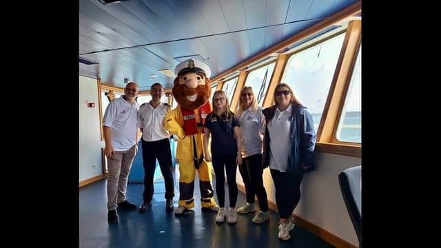 Volunteers of Newhaven RNLI with DFDS Captain and Stormy Stan