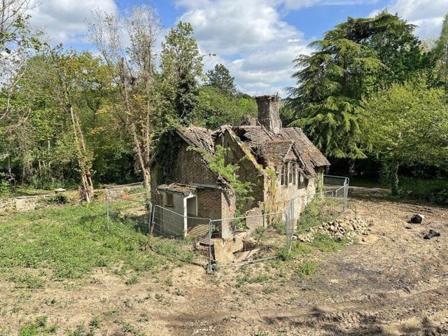 The house is within around a third of an acre