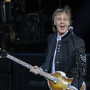 Sir Paul McCartney performs in concert during his One on One tour at Hollywood Casino Amphitheatre on July 26, 2017 in Tinley Park, Illinois. (Photo by Kamil Krzaczynski / AFP) (Photo by KAMIL KRZACZYNSKI/AFP via Getty Images)