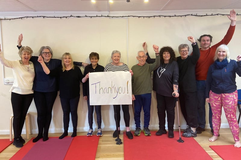 Sussex MS Centre members from a Pilates class, thanking the People's Postcode Lottery