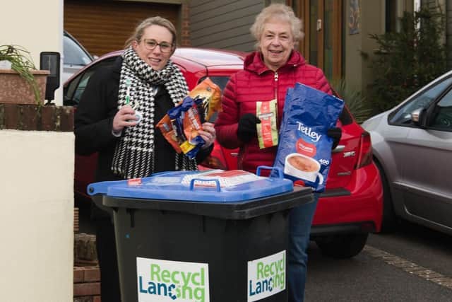 Left to right: Katie Jeswani and Sue Wellfare standing by Douglas the Drop Off bin at one of the collection points at 34 Firle Road North Lancing BN15 0NZ. It is open 24/7 for the community to drop off their waste.