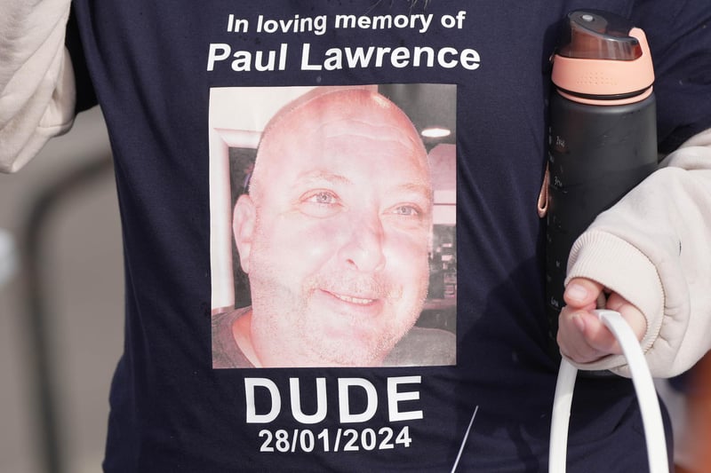 Participants all wore shirts bearing a picture of Paul.